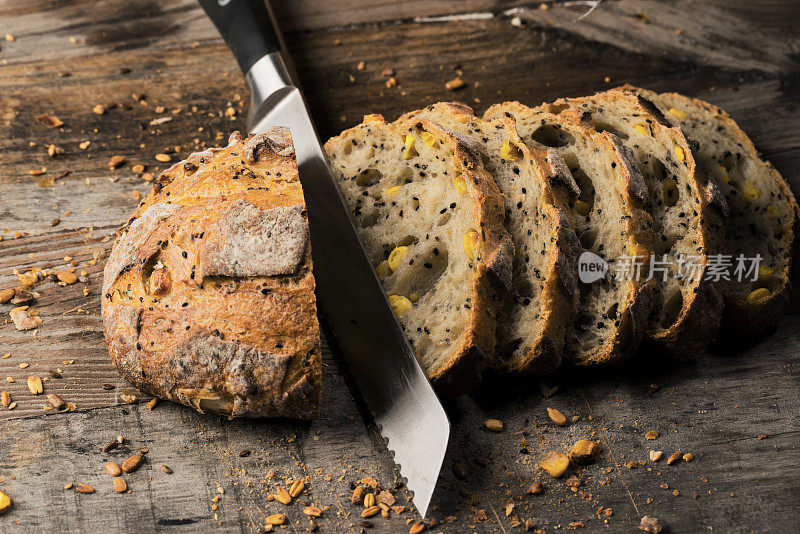 Freshly baked bread on wooden table